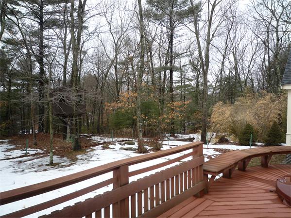 6 Stanley Road Middleton, MA 01949 - Photo 23 of 24 a view of a wooden deck with a yard