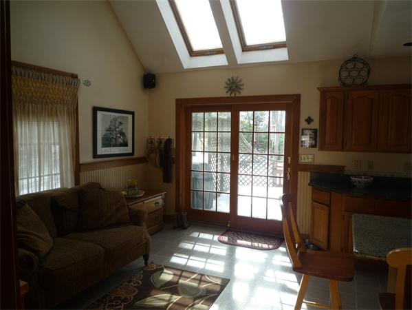 6 Stanley Road Middleton, MA 01949 - Photo 8 of 24 a living room with furniture and a window