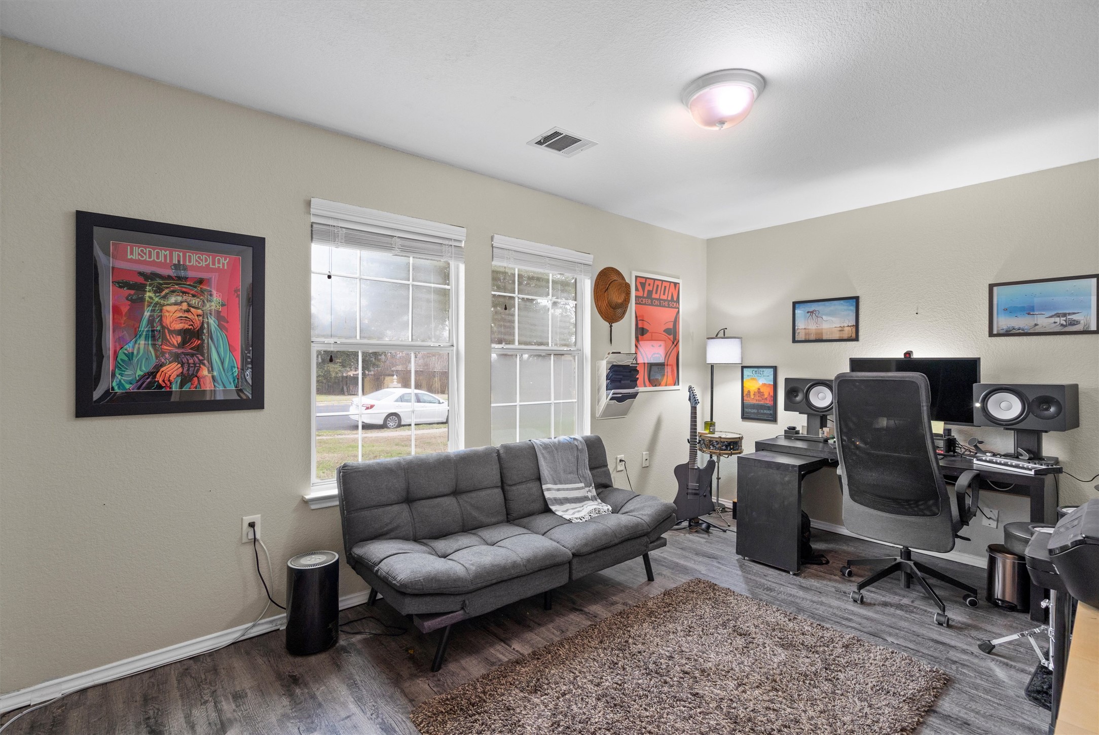 12117 Briarcreek Loop Manor, TX 78653 - Photo 16 of 29 Office area with wood finished floors and baseboards