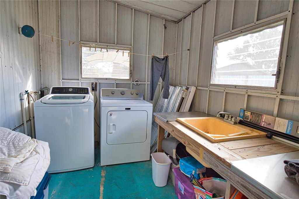 2302 Southeast Red Baron Drive Arcadia, FL 34266 - Photo 28 of 47 a room with storage and utility