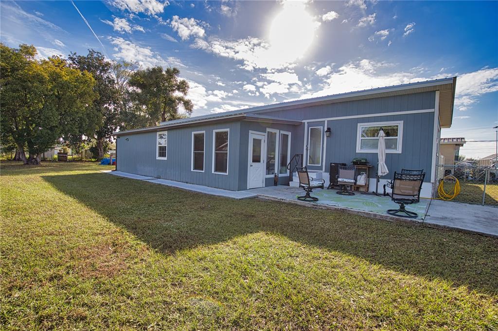 2302 Southeast Red Baron Drive Arcadia, FL 34266 - Photo 4 of 47 a view of a house with swimming pool and sitting area