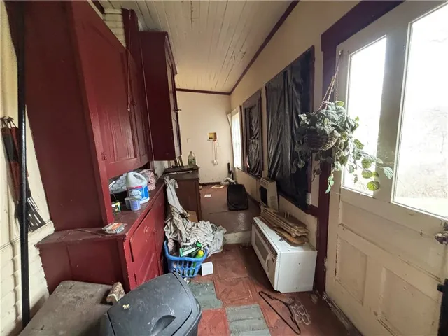 a view of balcony with furniture