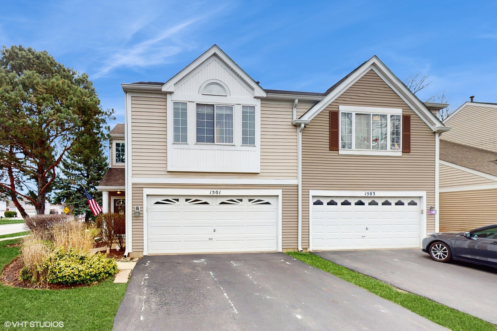 1501 Spaulding Road Bartlett, IL 60103 - Photo 1 of 28 front view of a house with a yard