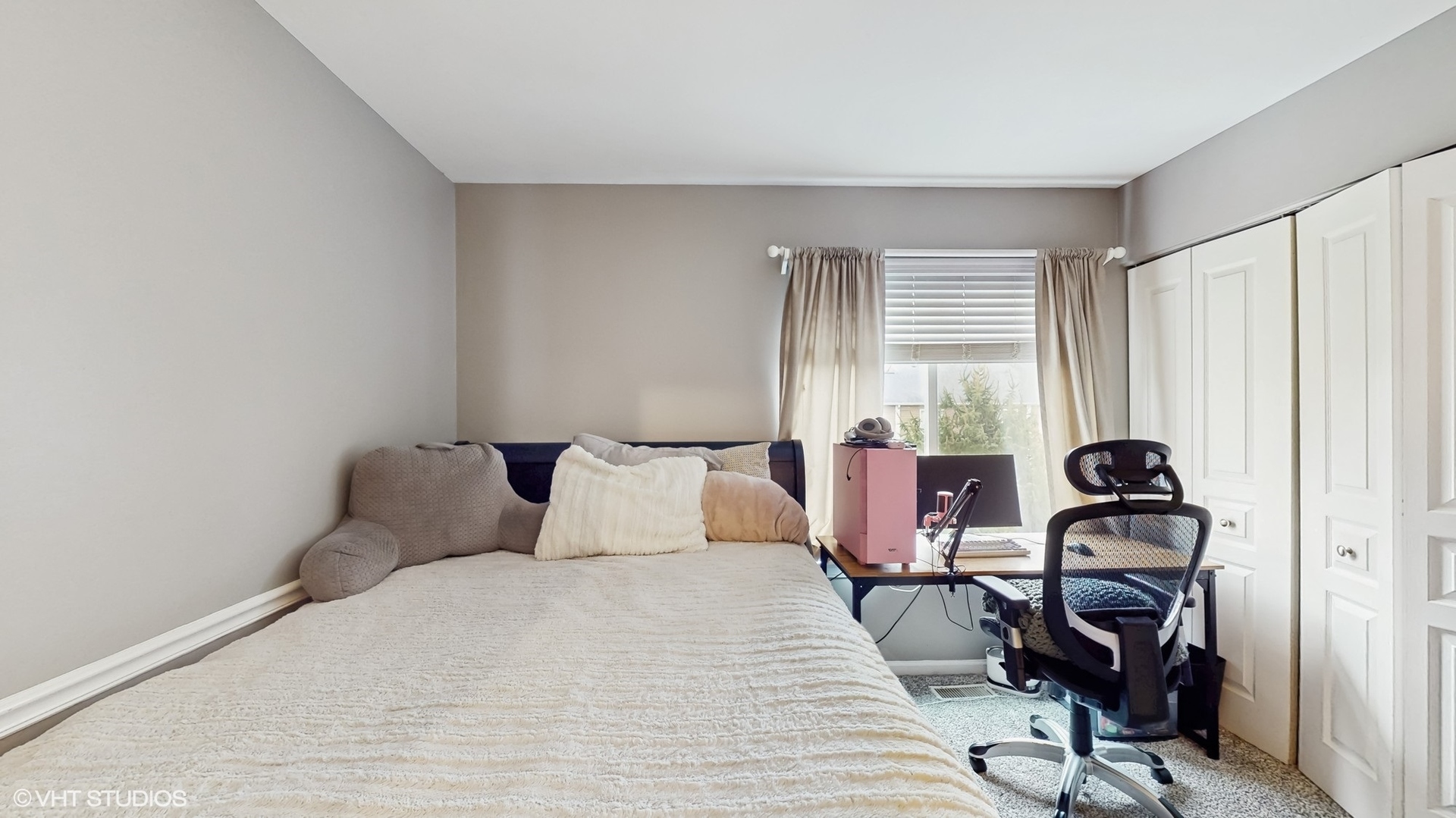 1501 Spaulding Road Bartlett, IL 60103 - Photo 14 of 28 a bedroom with a bed and a window