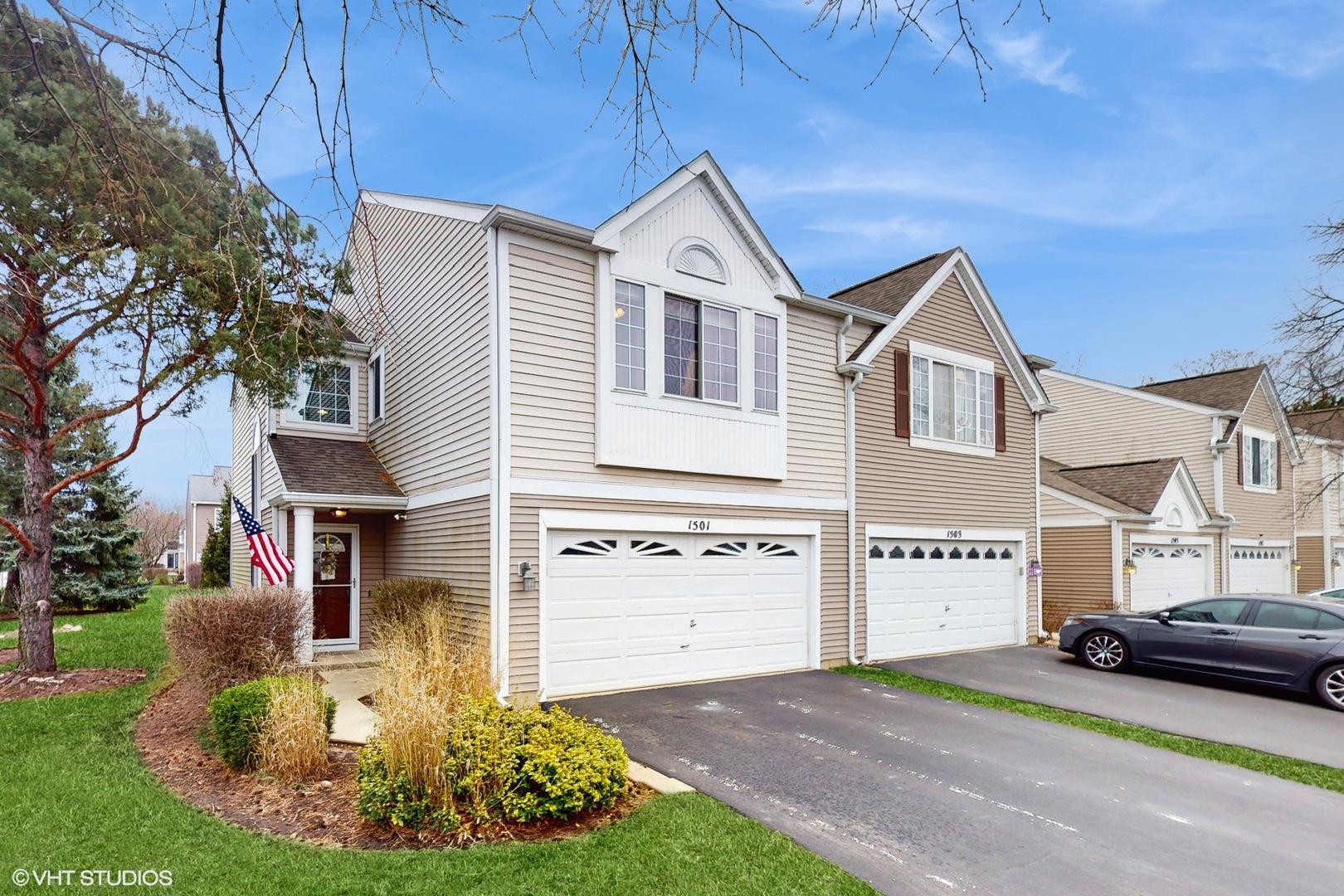 1501 Spaulding Road Bartlett, IL 60103 - Photo 2 of 28 a front view of a house with a yard