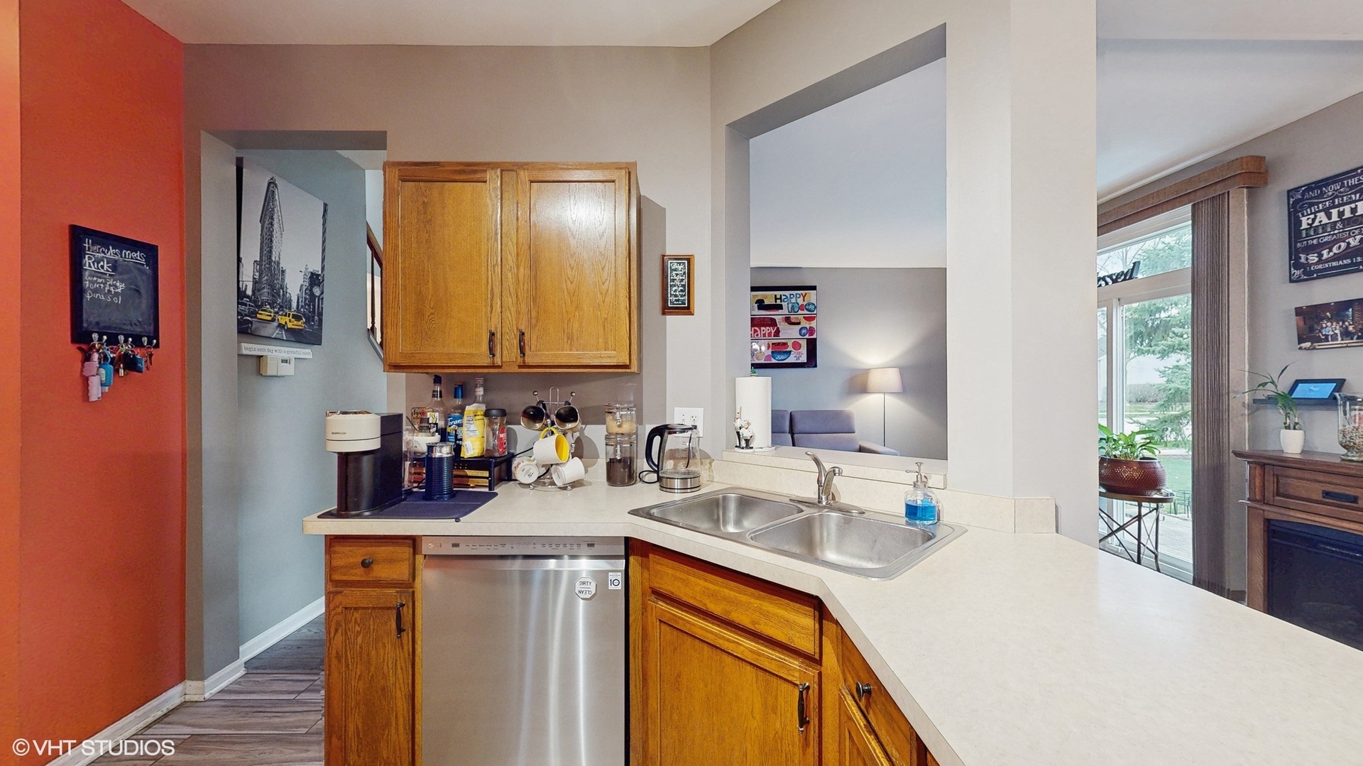 1501 Spaulding Road Bartlett, IL 60103 - Photo 6 of 28 a kitchen with a sink and a refrigerator