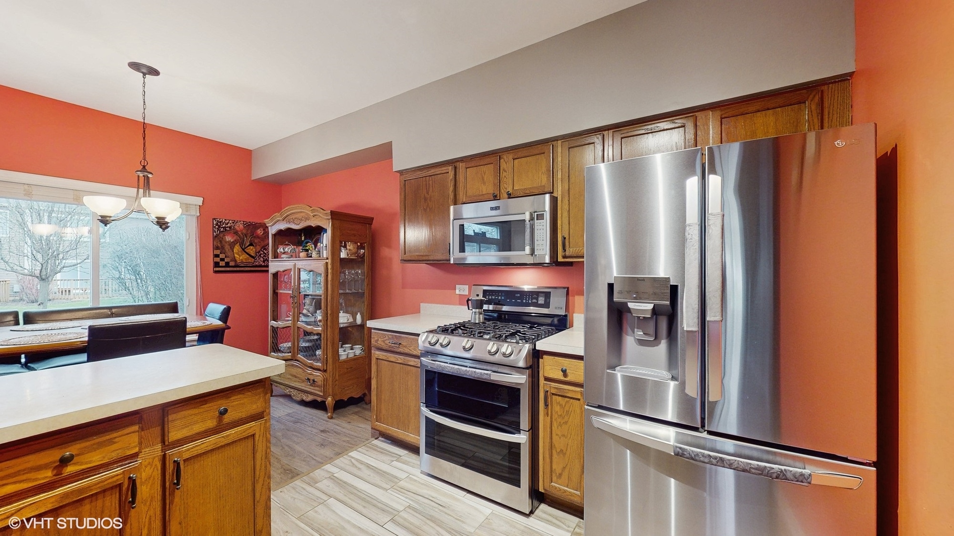 1501 Spaulding Road Bartlett, IL 60103 - Photo 7 of 28 a kitchen with stainless steel appliances a refrigerator and a stove top oven