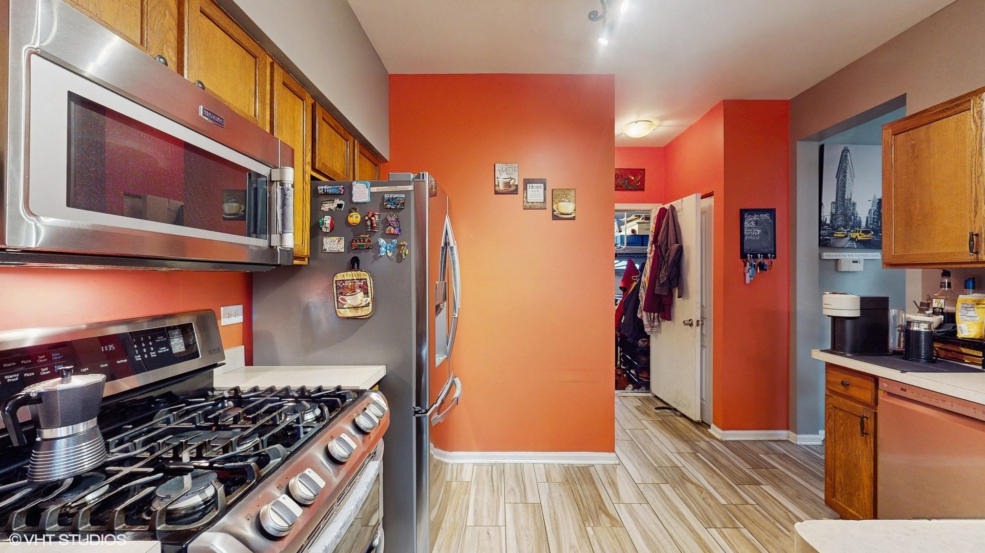 1501 Spaulding Road Bartlett, IL 60103 - Photo 8 of 28 a kitchen with stainless steel appliances a stove and a refrigerator