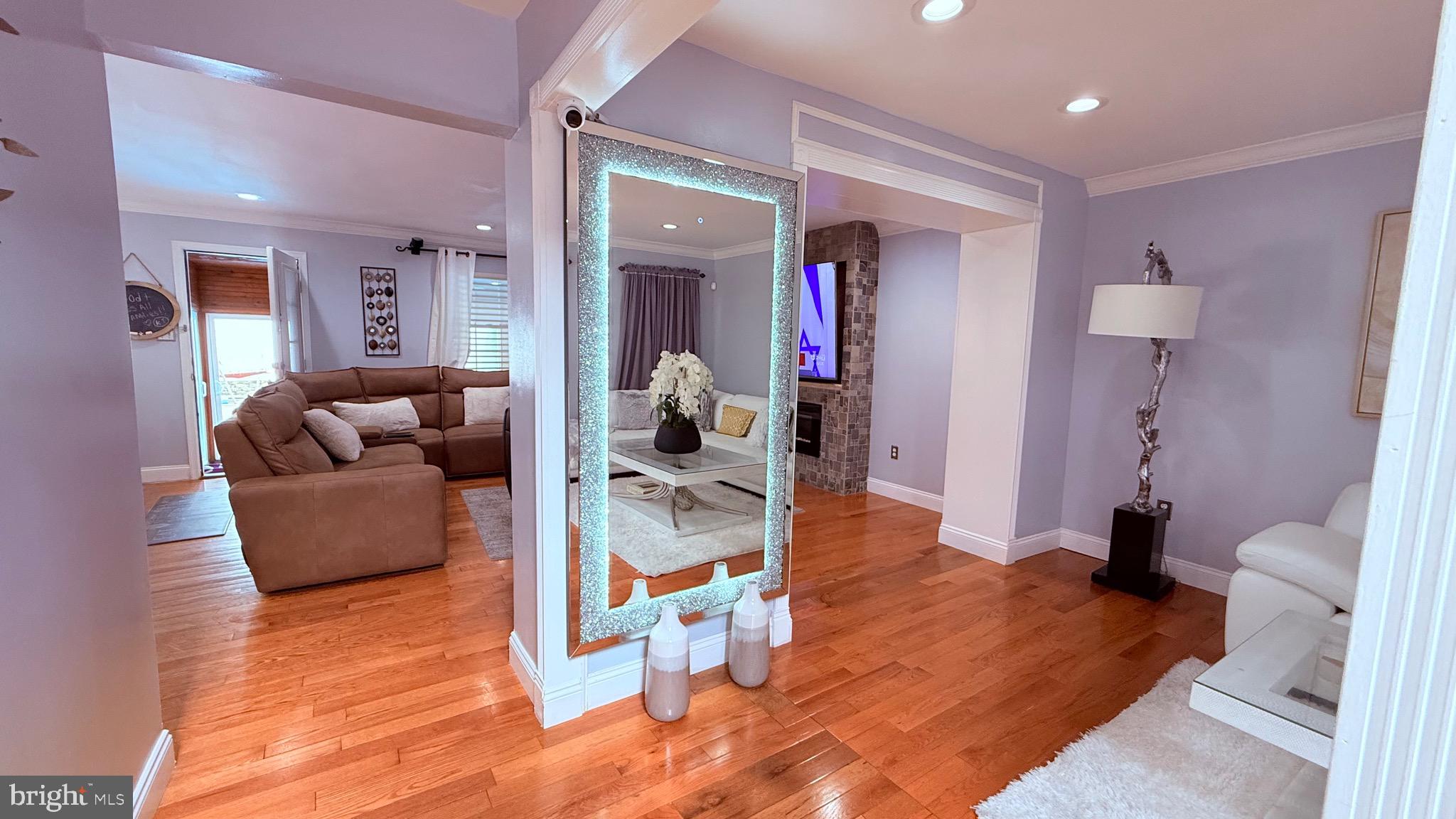8905 Springview Road Philadelphia, PA 19115 - Photo 18 of 113 a living room with furniture and a wooden floor