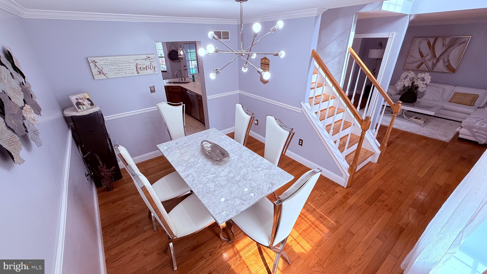 8905 Springview Road Philadelphia, PA 19115 - Photo 30 of 113 a living room with furniture and wooden floor
