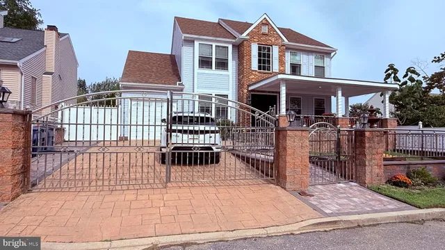 a car parked in front of a brick building