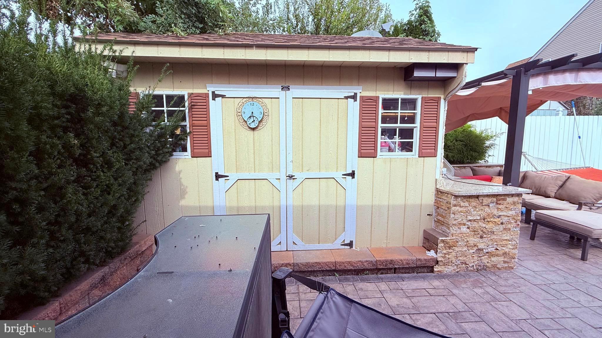8905 Springview Road Philadelphia, PA 19115 - Photo 59 of 113 a front view of a house with garden
