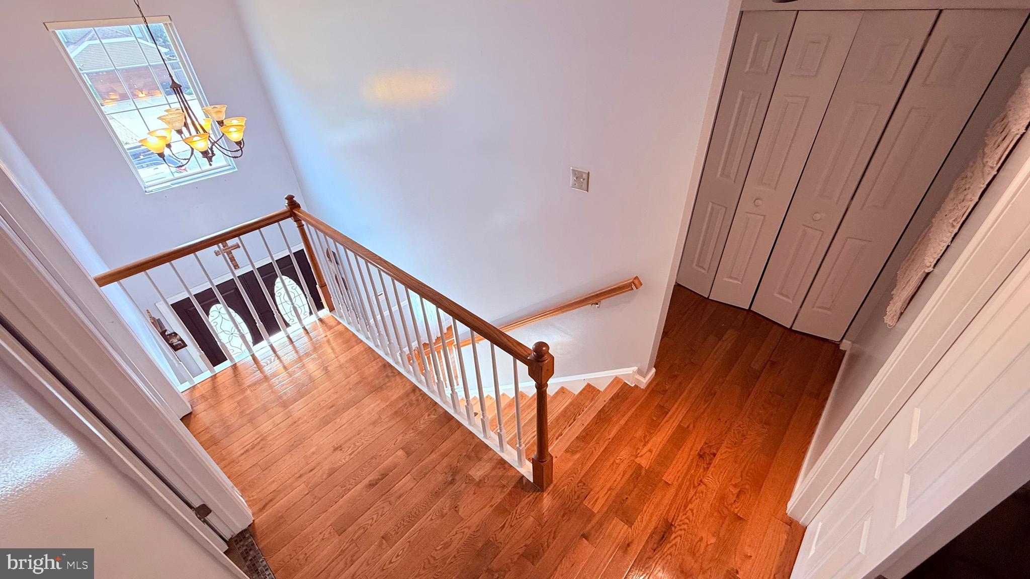 8905 Springview Road Philadelphia, PA 19115 - Photo 82 of 113 a view of staircase with railing and white walls