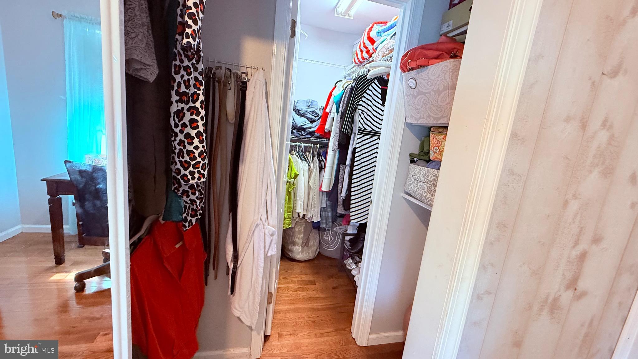 8905 Springview Road Philadelphia, PA 19115 - Photo 90 of 113 a view of walk in closet with clothes and shoes