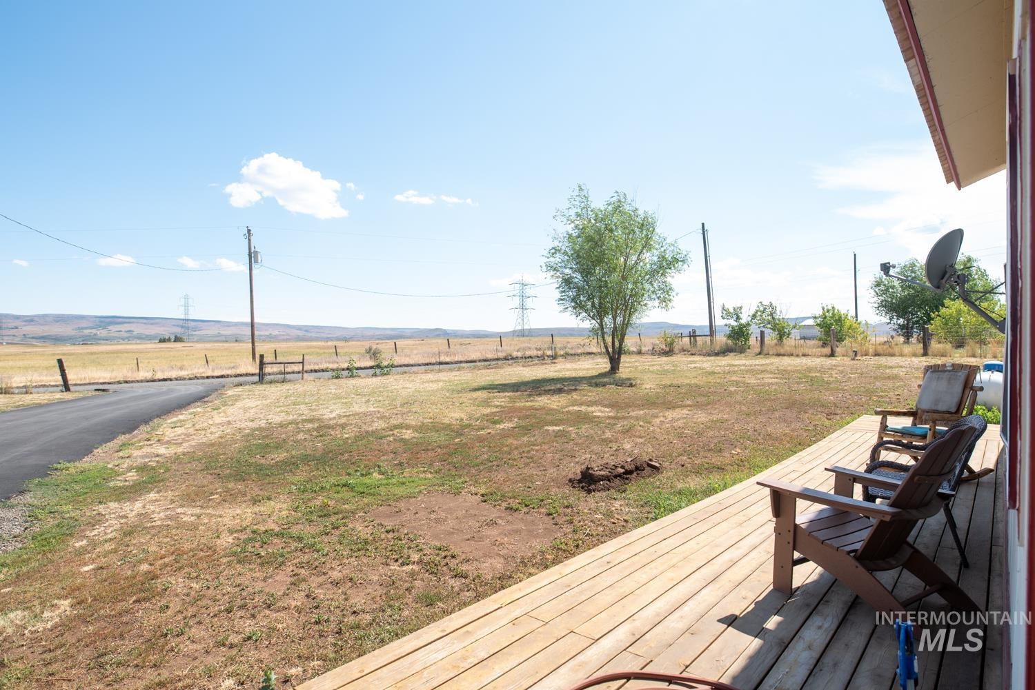 2240 Waite Road Midvale, ID 83645 - Photo 31 of 42 Wooden deck featuring a view of rural / pastoral area