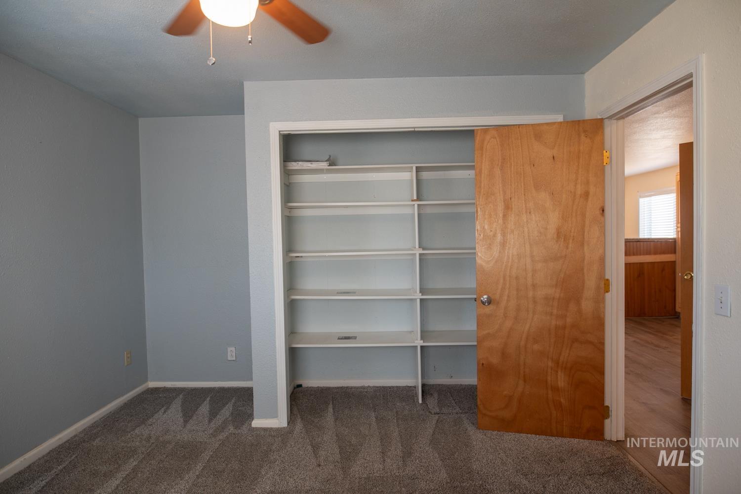 2240 Waite Road Midvale, ID 83645 - Photo 6 of 42 Unfurnished bedroom with carpet floors and ceiling fan