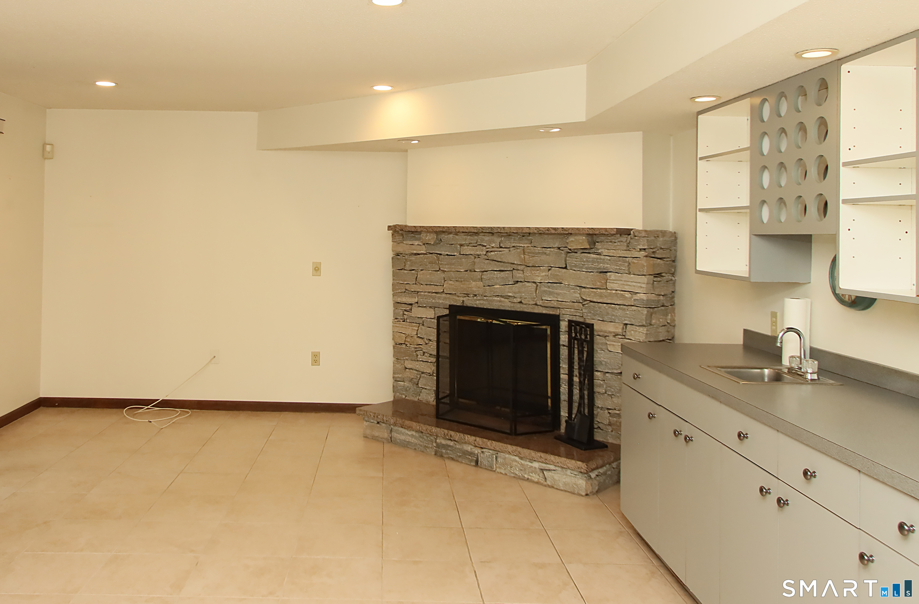 352 Center Street Wolcott, CT 06716 - Photo 30 of 40 a kitchen with a sink and a stove top oven