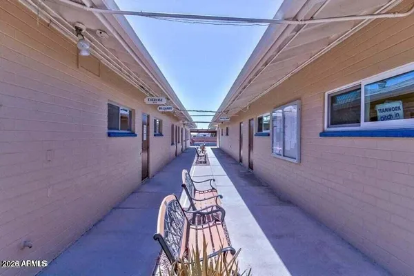 a narrow alley with a couch