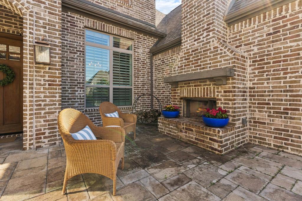 3912 Marble Hill Road Frisco, TX 75034 - Photo 36 of 40 Front Courtyard with fireplace