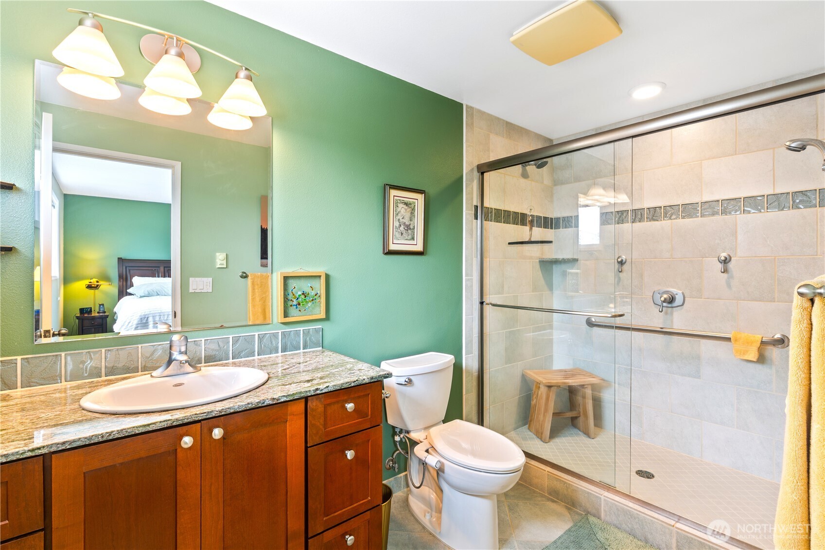 9609 Samish Island Road Bow, WA 98232 - Photo 13 of 33 a bathroom with a granite countertop sink toilet and shower