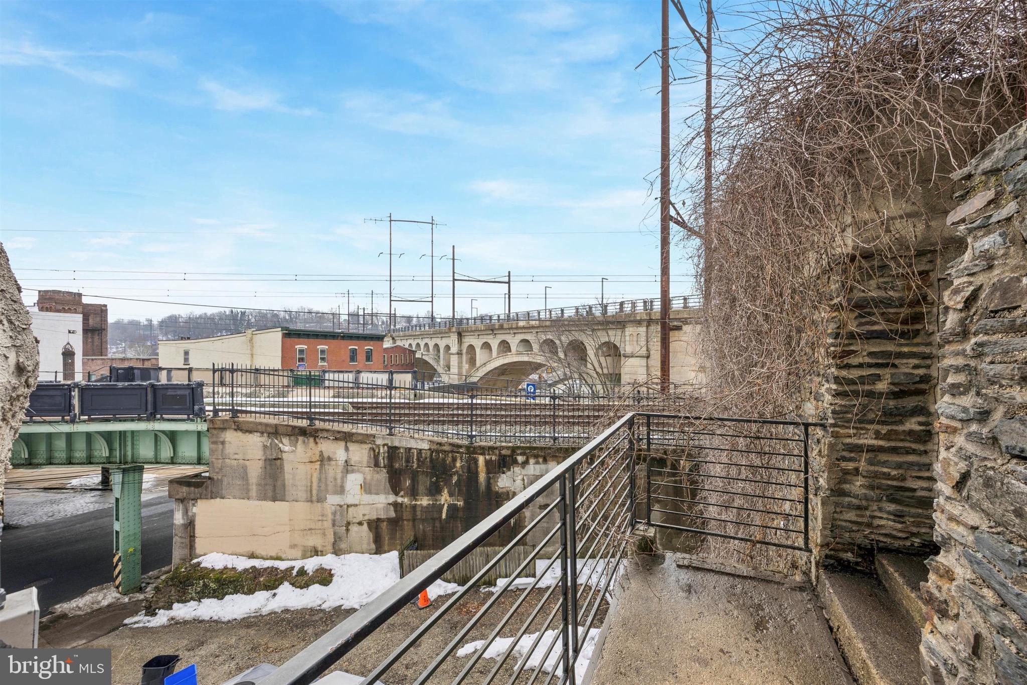 4522 Baker Street, Unit 6 Philadelphia, PA 19127 - Photo 10 of 11 a view of tall buildings from a balcony