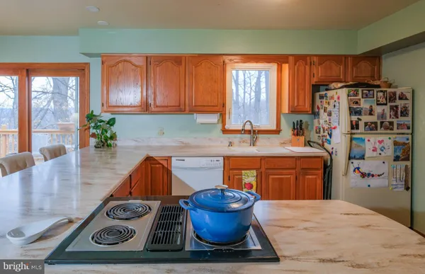 a room with lots of different colored cloths