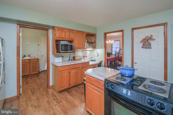 a view of a room with workspace and couch