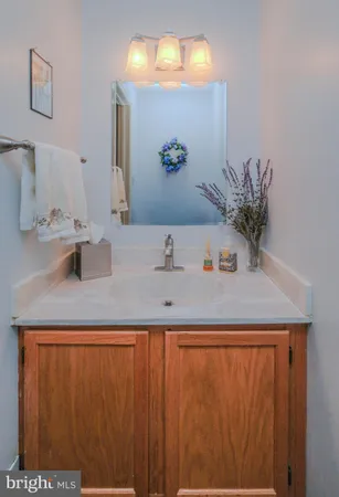 a bedroom with a bed and a dresser in it