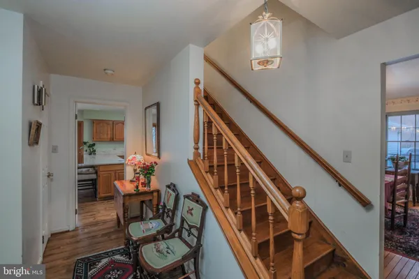 a kitchen with stainless steel appliances granite countertop a sink counter space and a window