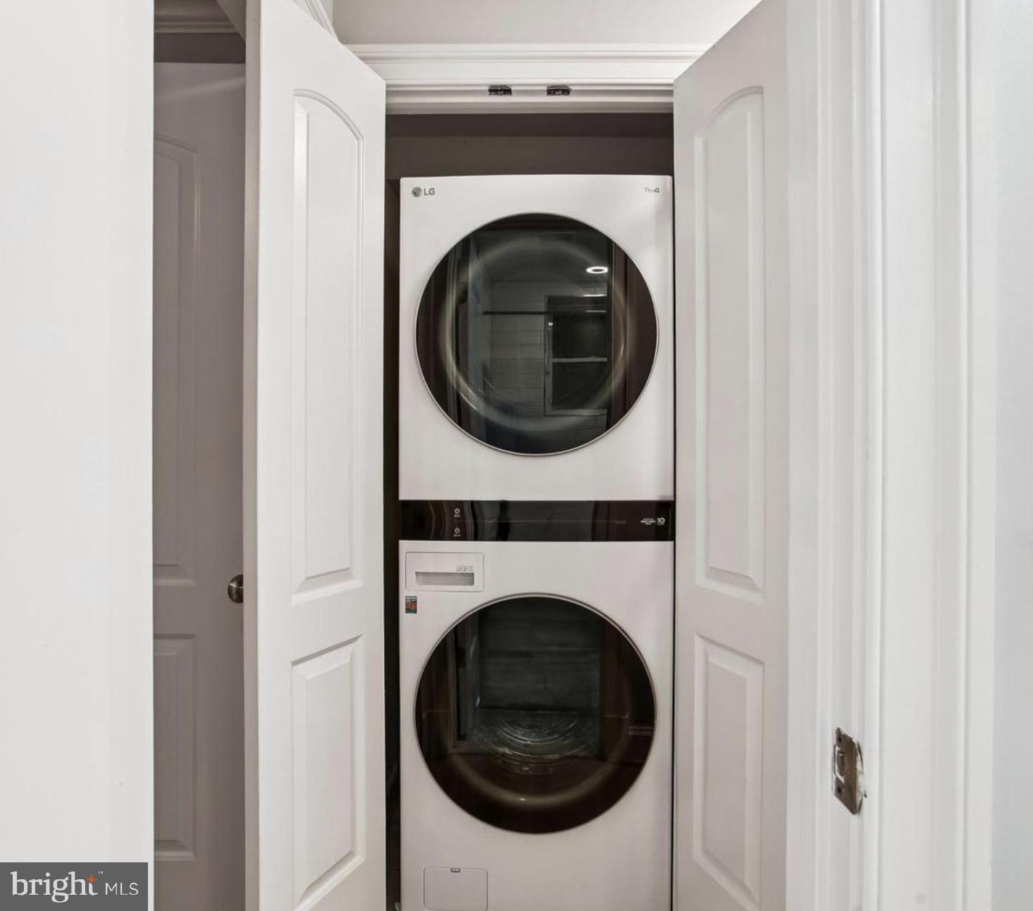 1740 18th Street Northwest, Unit T2 Washington, DC 20009 - Photo 6 of 12 a view of a hallway with washer and dryer