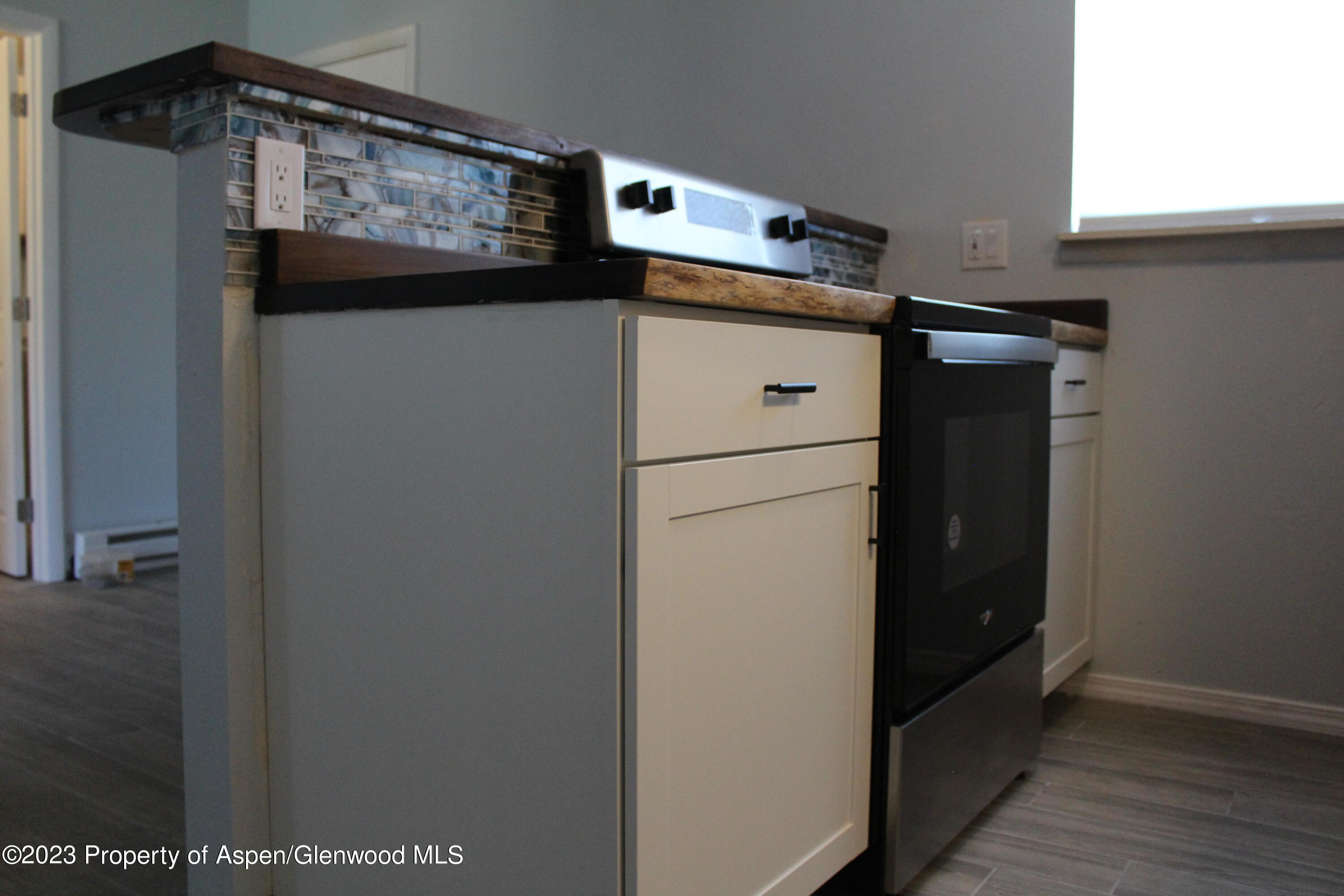 1322 East 7th Street, Unit 3 Rifle, CO 81650 - Photo 3 of 8 a close view of washer and dryer