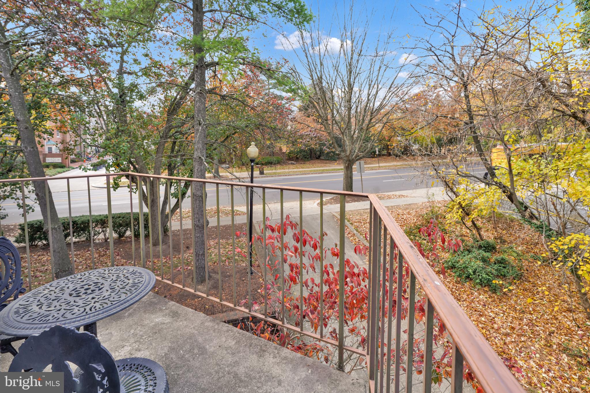 4339 Massachusetts Avenue Northwest, Unit 4339 Washington, DC 20016 - Photo 12 of 25 a view of balcony with wooden floor and fence