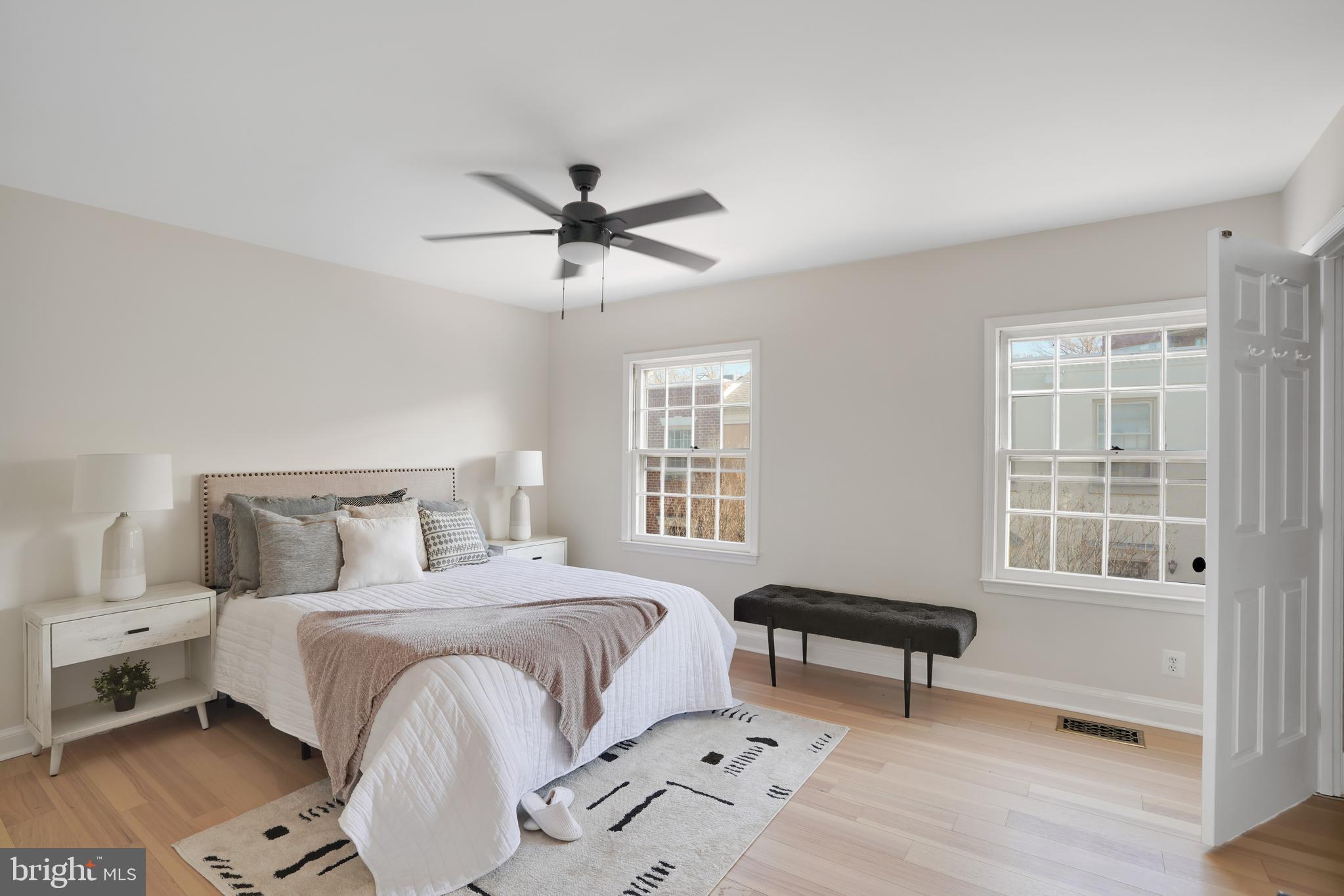 4339 Massachusetts Avenue Northwest, Unit 4339 Washington, DC 20016 - Photo 15 of 25 a bedroom with a bed furniture and a window