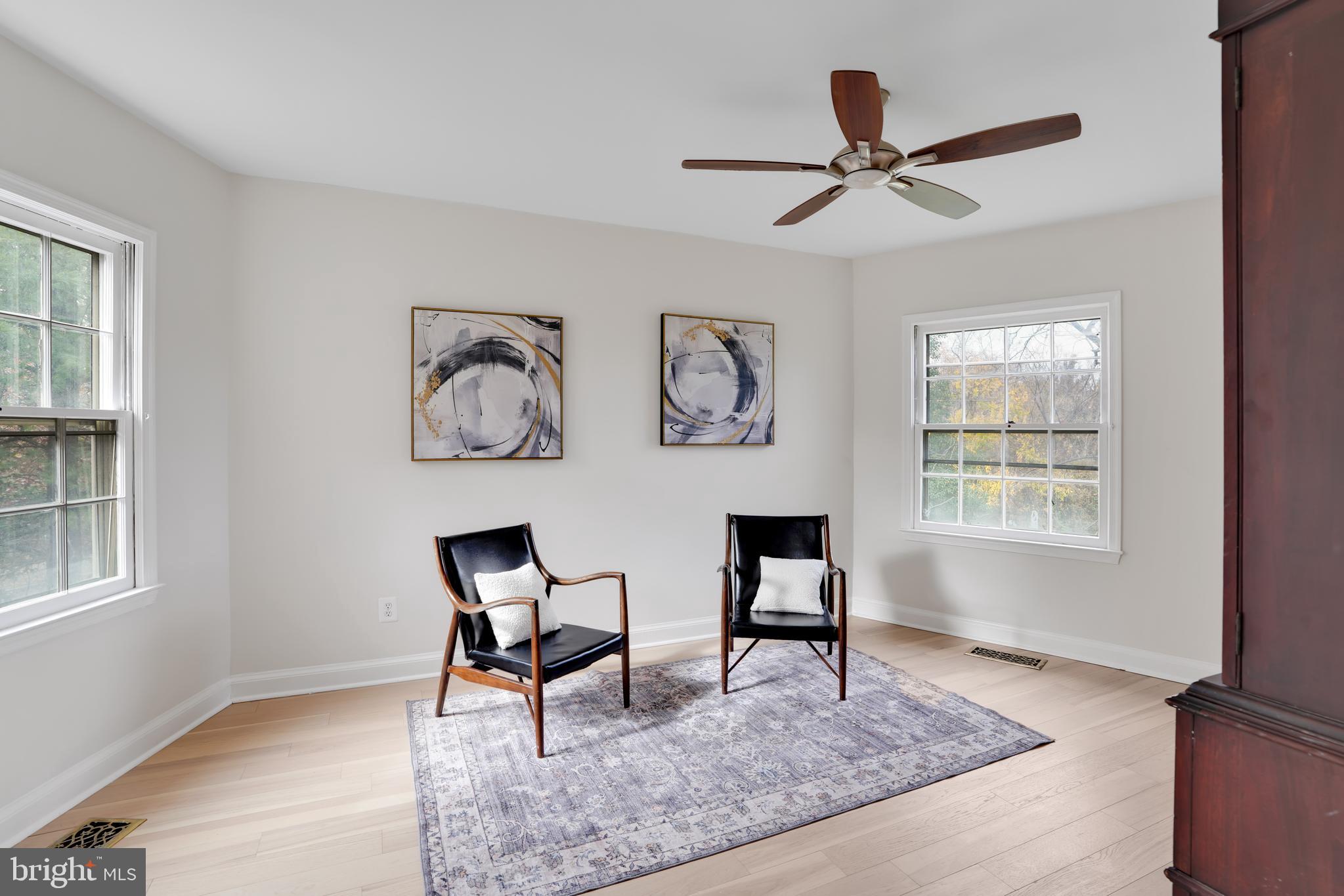 4339 Massachusetts Avenue Northwest, Unit 4339 Washington, DC 20016 - Photo 20 of 25 a living room with furniture and a window