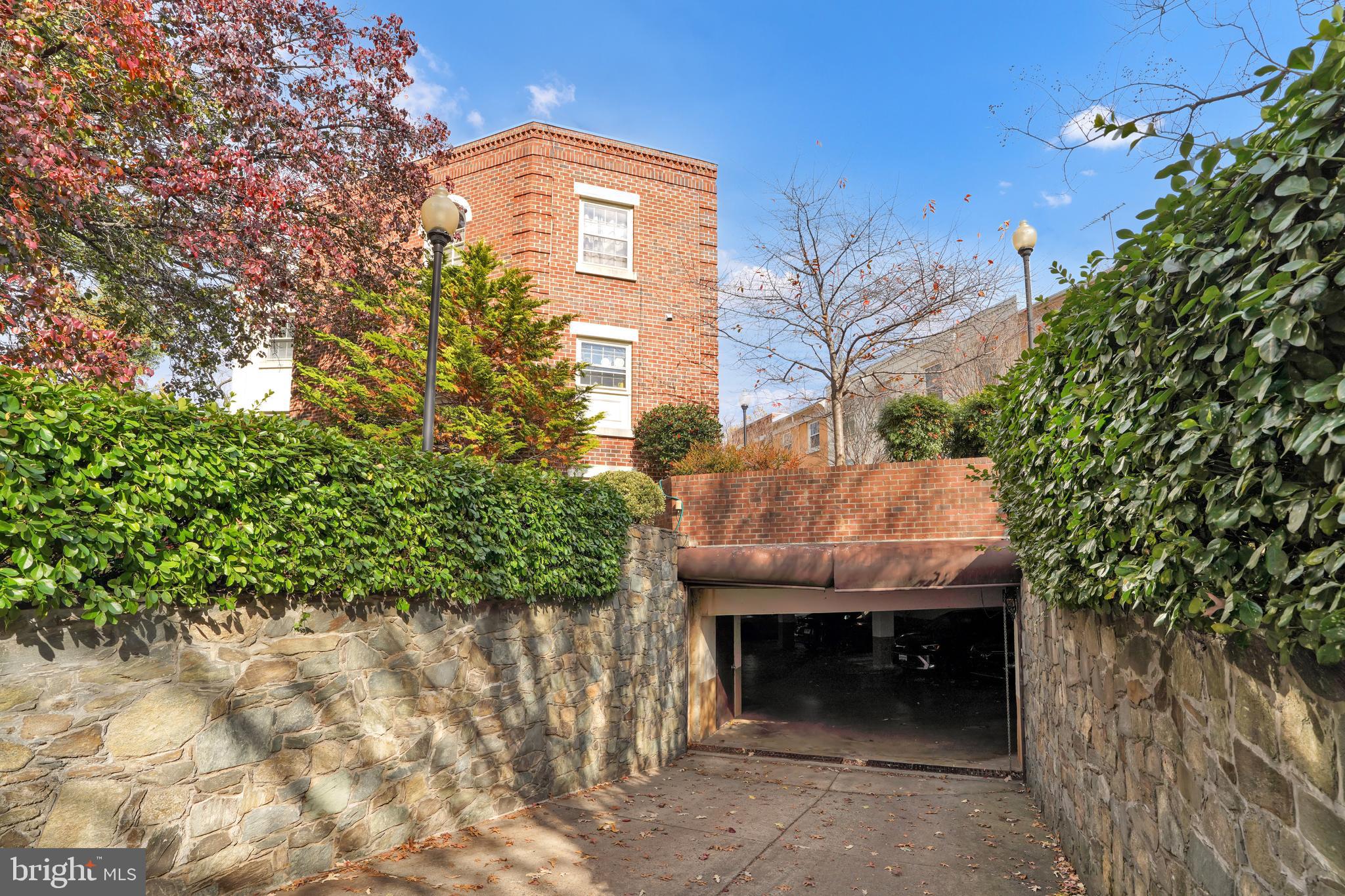 4339 Massachusetts Avenue Northwest, Unit 4339 Washington, DC 20016 - Photo 24 of 25 a view of backyard with a tree