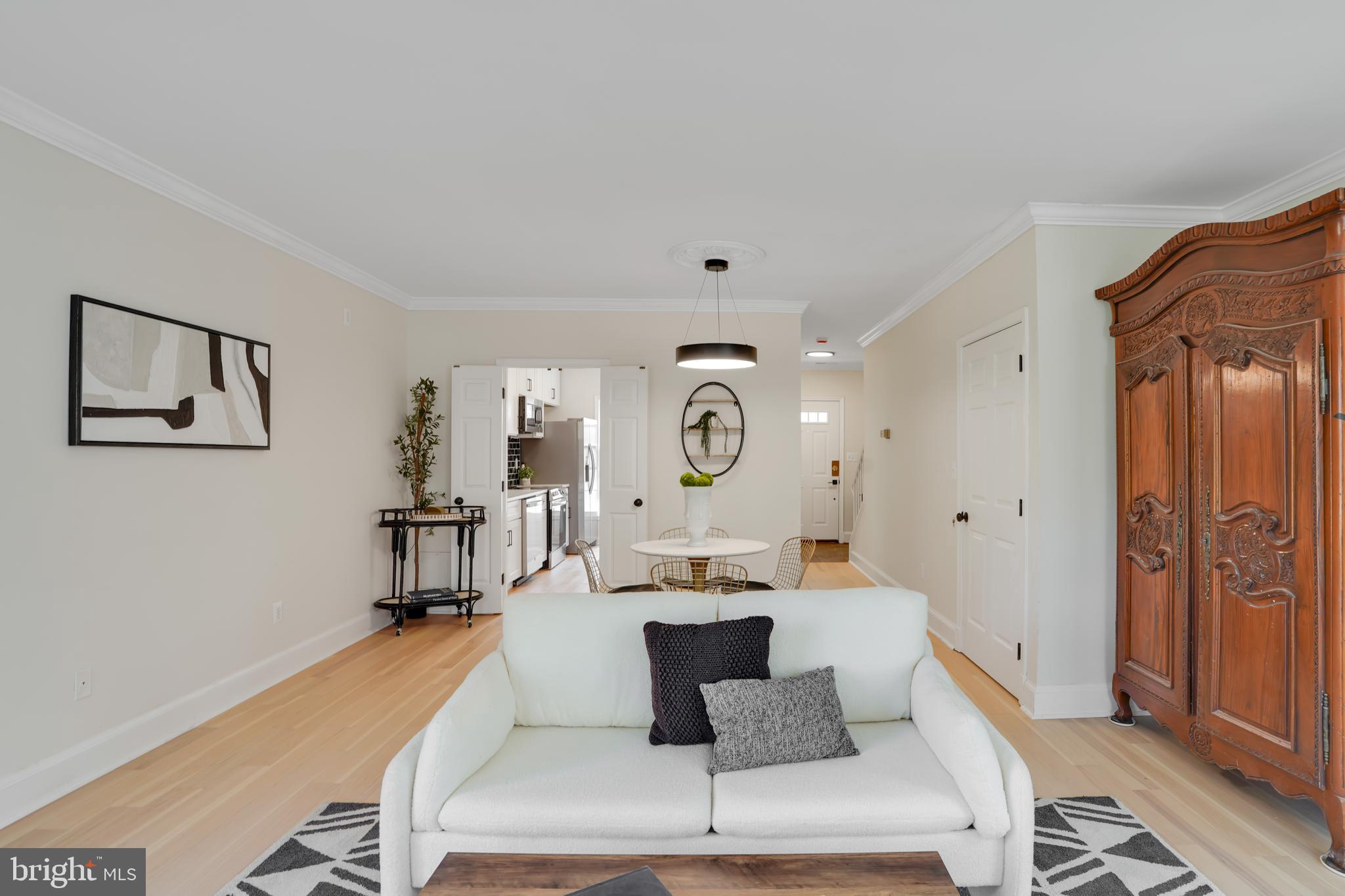 4339 Massachusetts Avenue Northwest, Unit 4339 Washington, DC 20016 - Photo 6 of 25 a living room with furniture