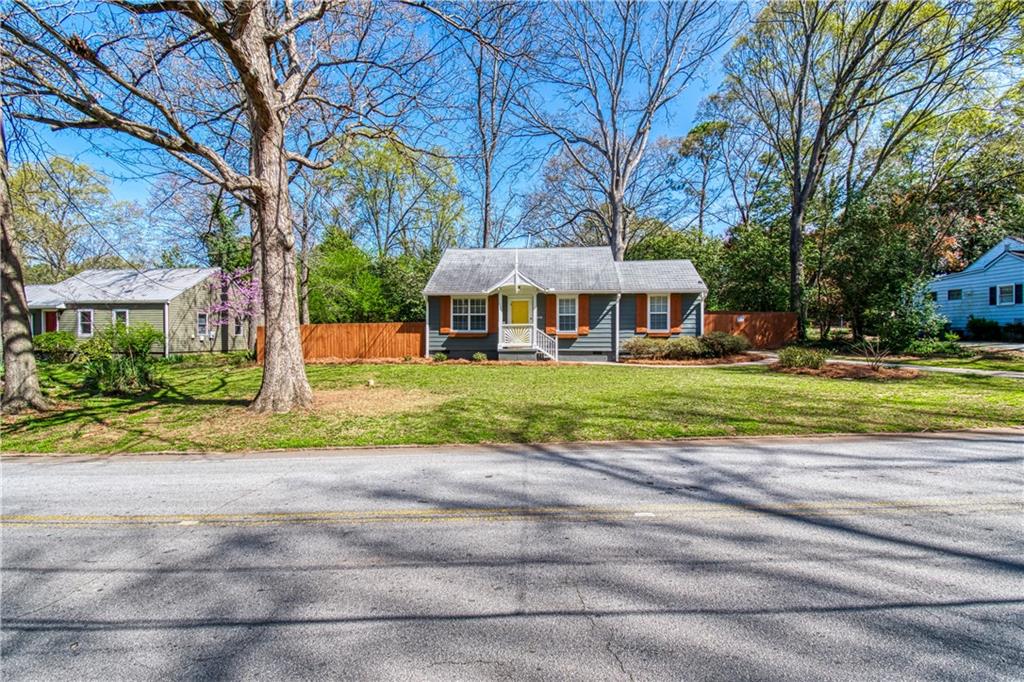 2848 Midway Road Decatur, GA 30030 - Photo 1 of 1 a view of a house with a yard and large trees