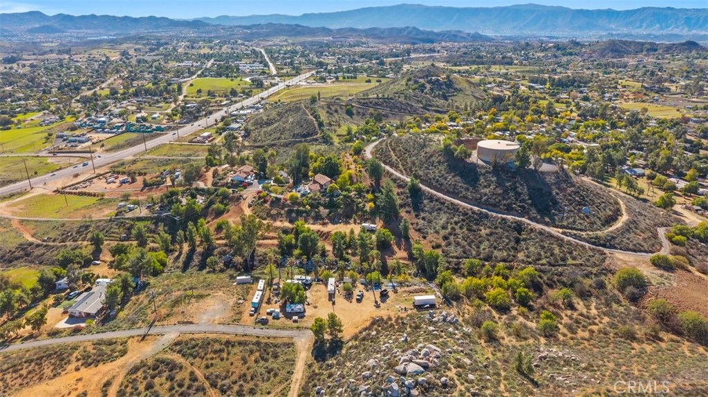 0 Kimes Lane Perris, CA 92570 - Photo 8 of 17 an aerial view of residential houses with outdoor space