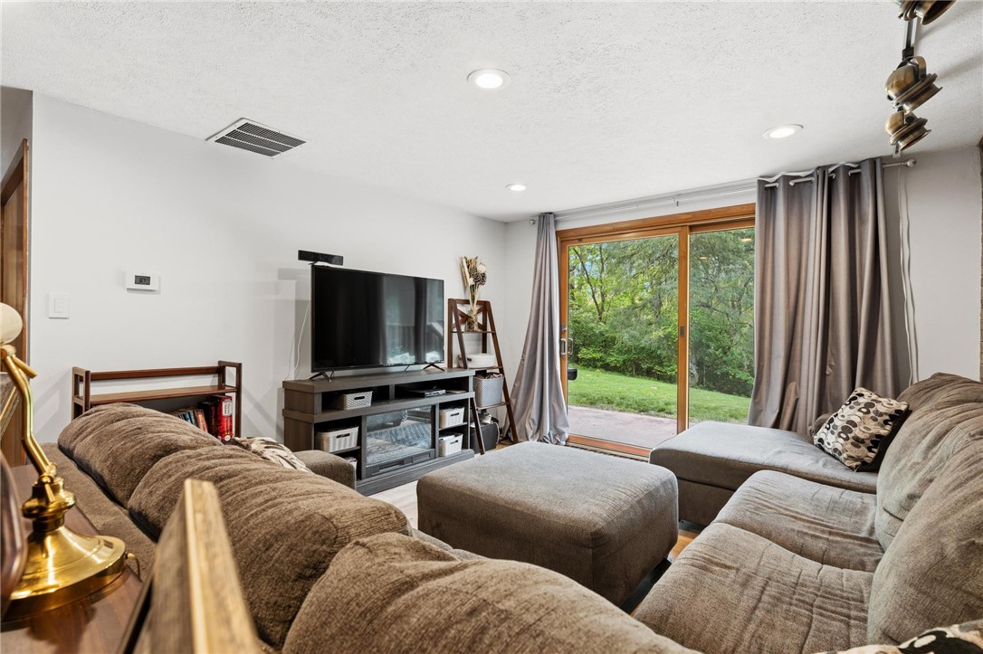 1940 Armstrong Road Fairborn, OH 45324 - Photo 21 of 48 This inviting living space features ample natural light and seamless outdoor access.
