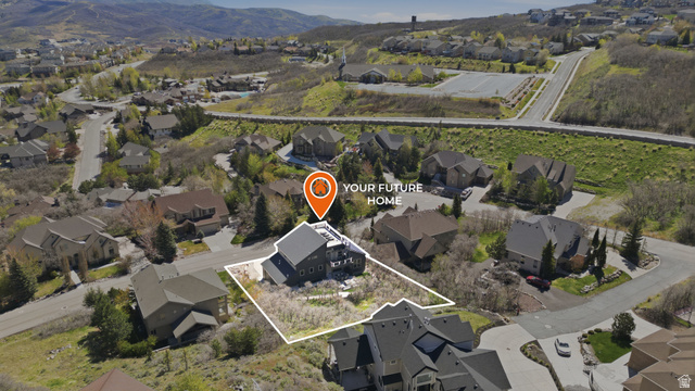 14902 Saddle Leaf Court Draper, UT 84020 - Photo 48 of 52 Aerial overview of property's location with nearby suburban area, property boundaries highlighted, and mountains