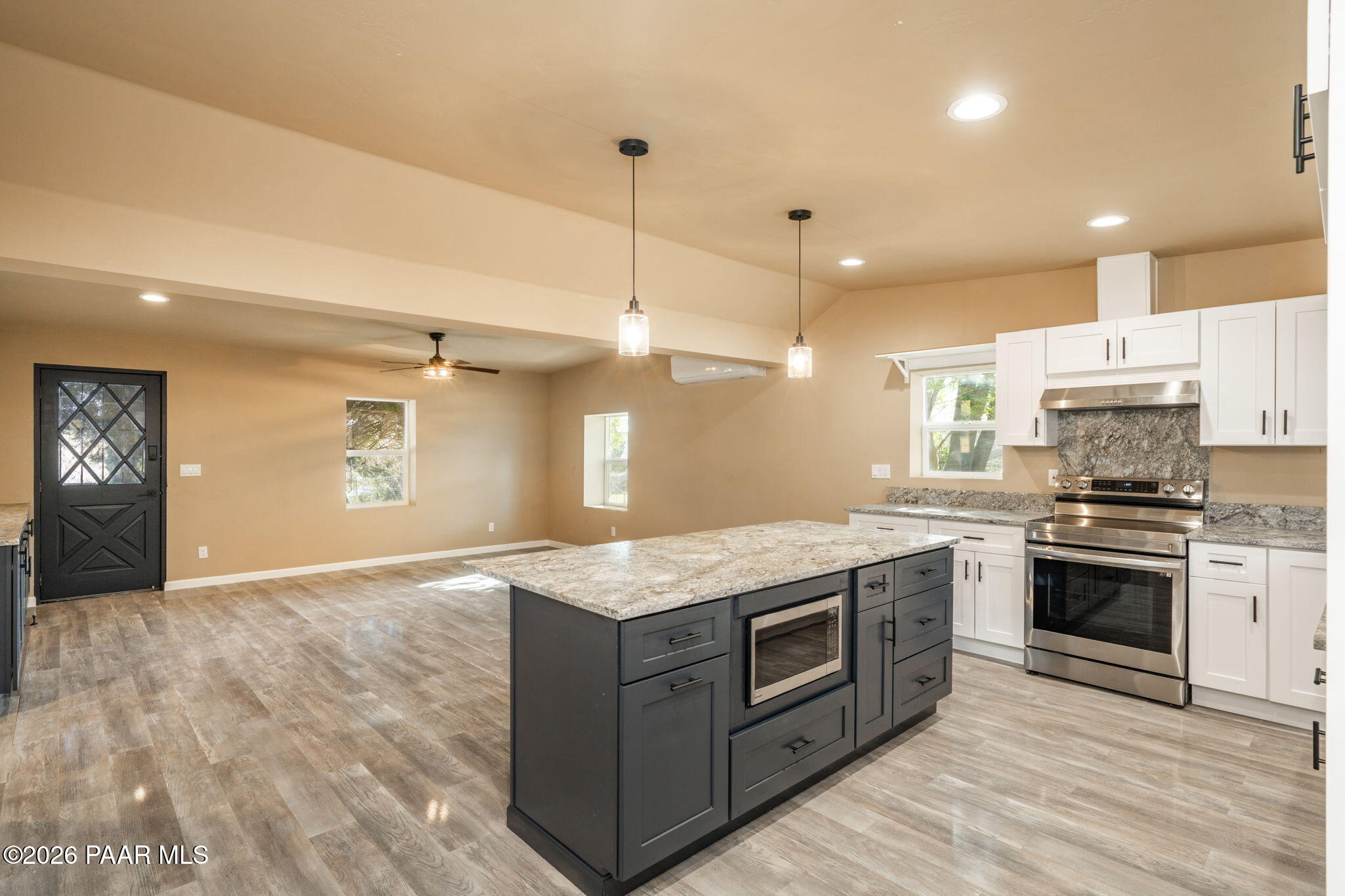 10101 Third Street Mayer, AZ 86333 - Photo 11 of 23 a kitchen with a stove and a sink