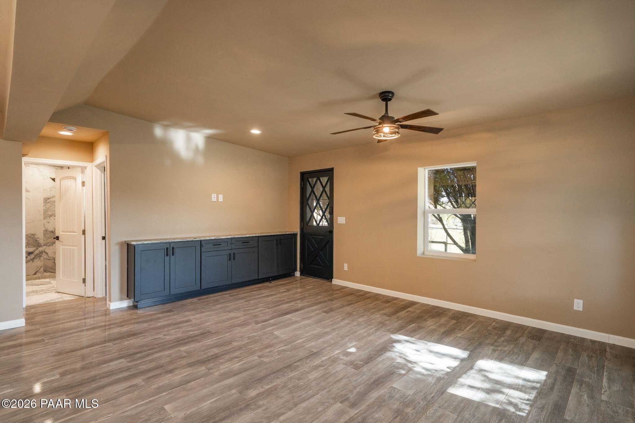 10101 Third Street Mayer, AZ 86333 - Photo 14 of 23 a view of an empty room with a window