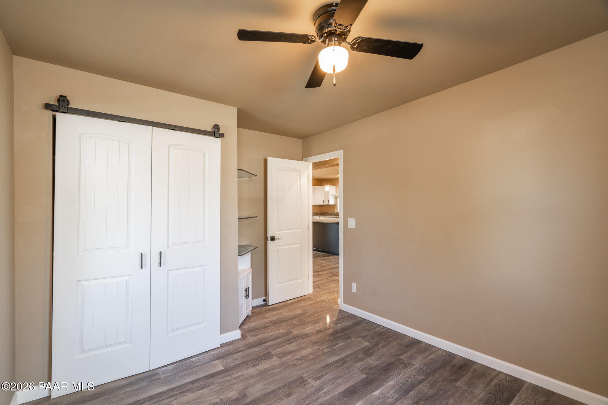 10101 Third Street Mayer, AZ 86333 - Photo 17 of 23 wooden floor in an empty room