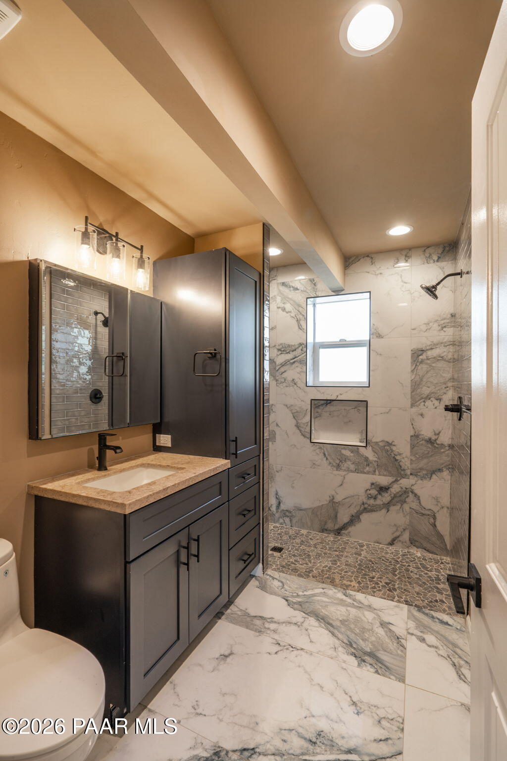 10101 Third Street Mayer, AZ 86333 - Photo 18 of 23 a bathroom with a double vanity sink mirror and shower
