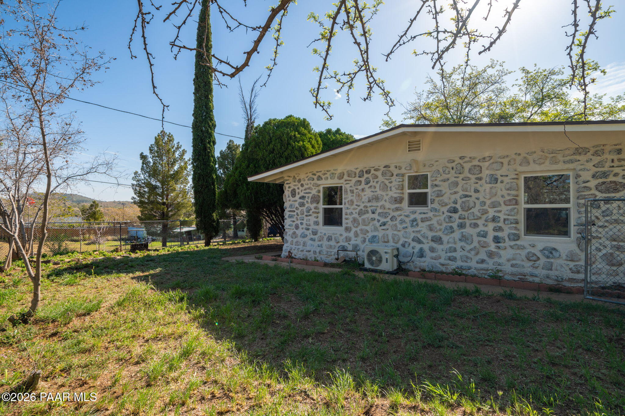 10101 Third Street Mayer, AZ 86333 - Photo 2 of 23 a front view of a house with a yard
