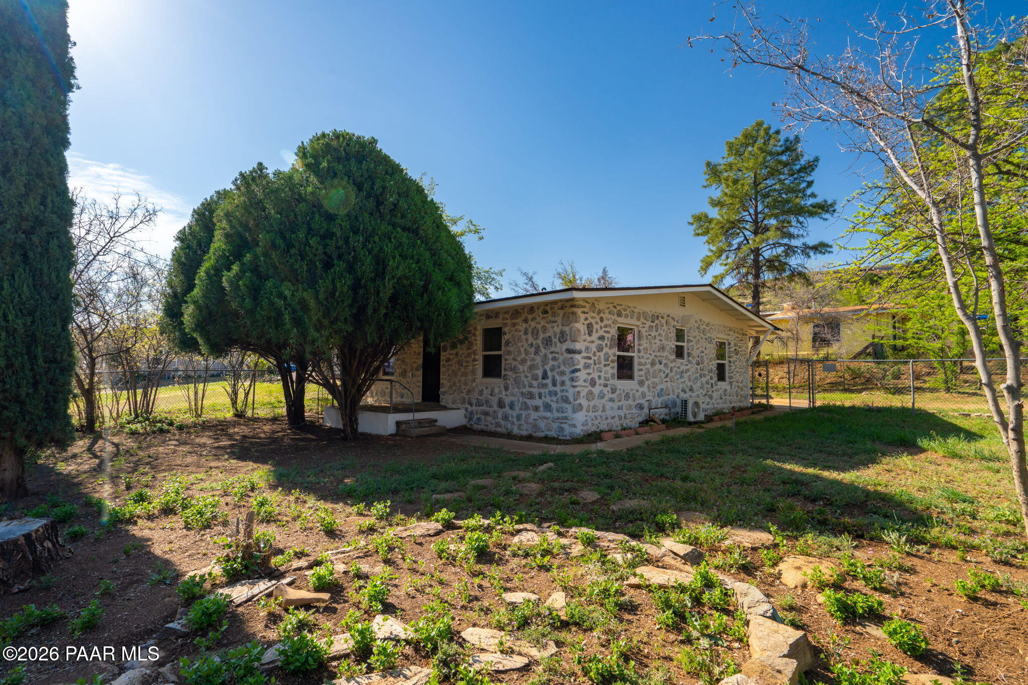 10101 Third Street Mayer, AZ 86333 - Photo 7 of 23 a view of a garden with a tree