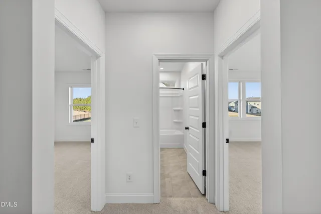 a house with swimming pool in front of it