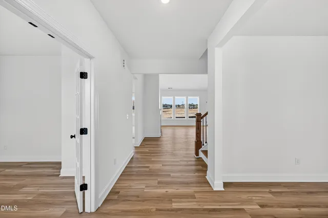 a front view of a house with a large windows