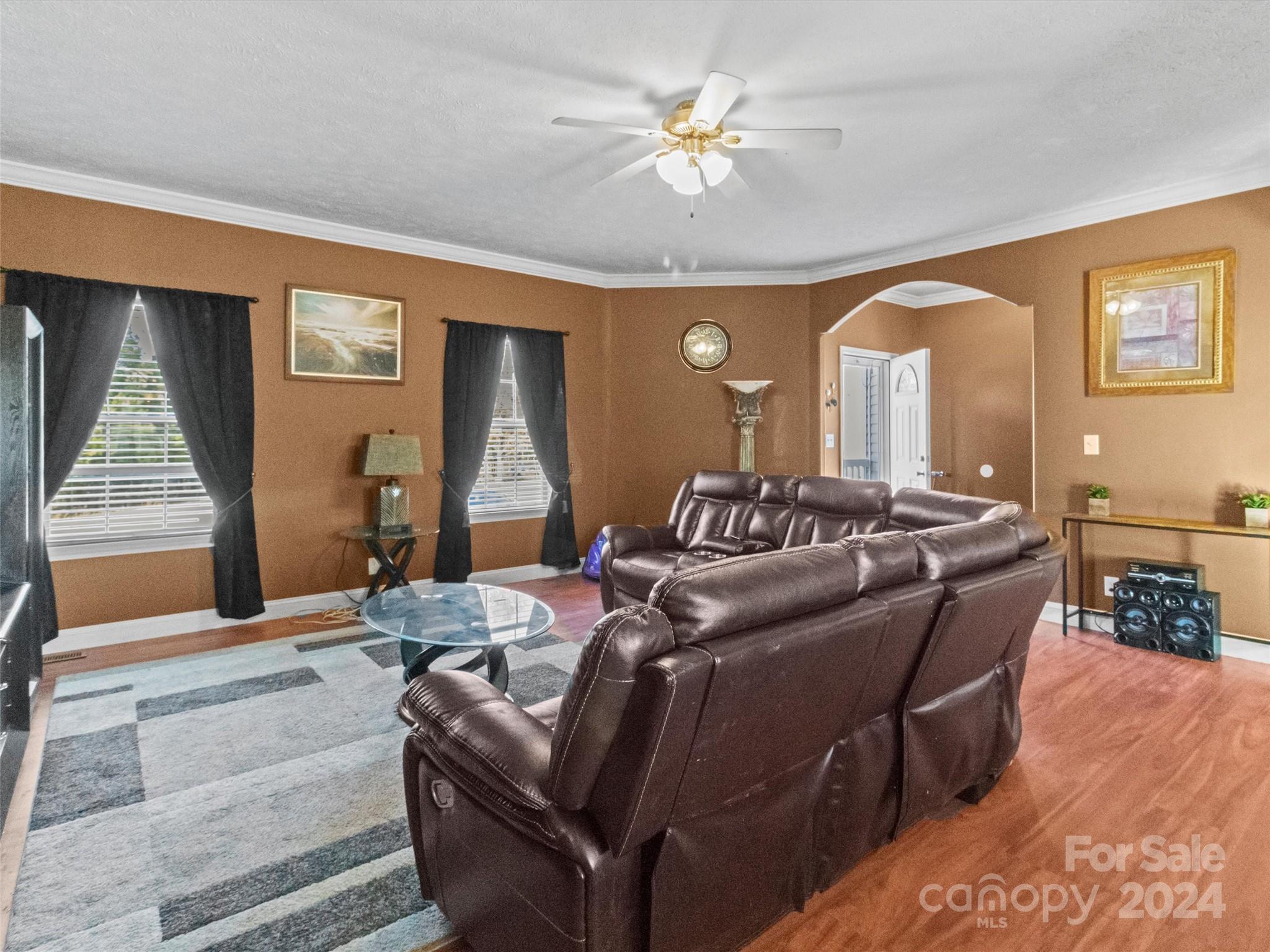 4334 Cannery Road Lancaster, SC 29720 - Photo 3 of 17 a living room with furniture and a chandelier
