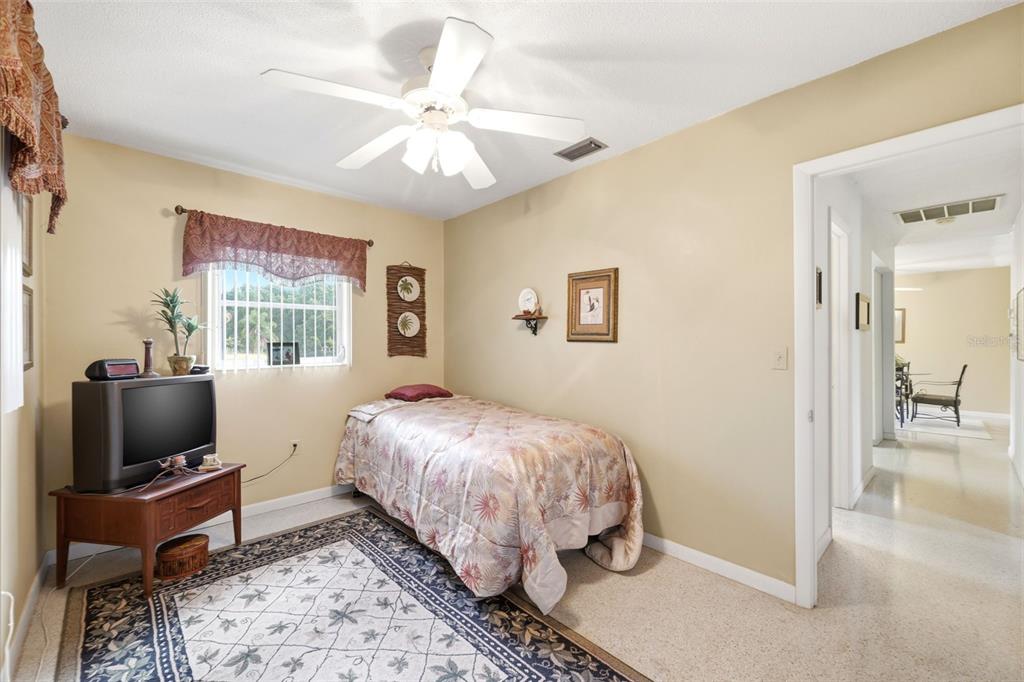 1830 South Mandarin Terrace Inverness, FL 34450 - Photo 46 of 47 a bedroom with bed and flat screen tv